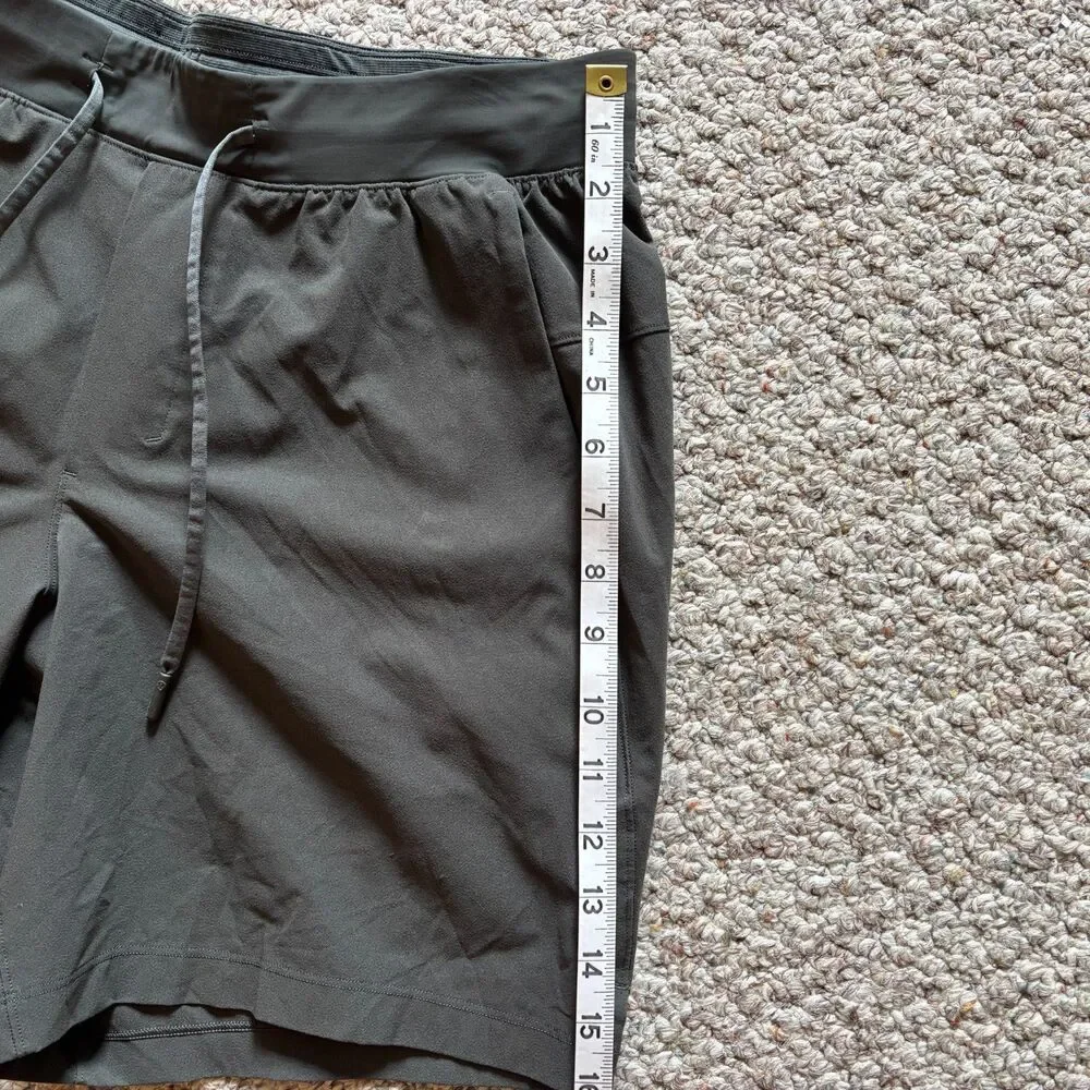 LuLulemon Men's Surge Lined Athletic Shorts Estimated Size Small
